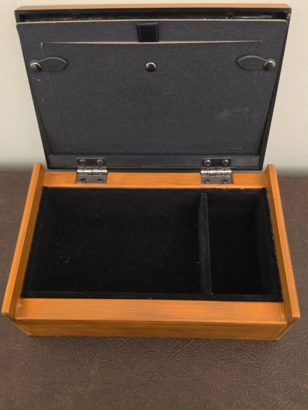 Vintage wooden jewelry box with a picture frame features a rectangular shape
